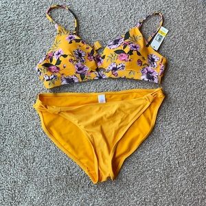 Flower, yellow bikini, size large.